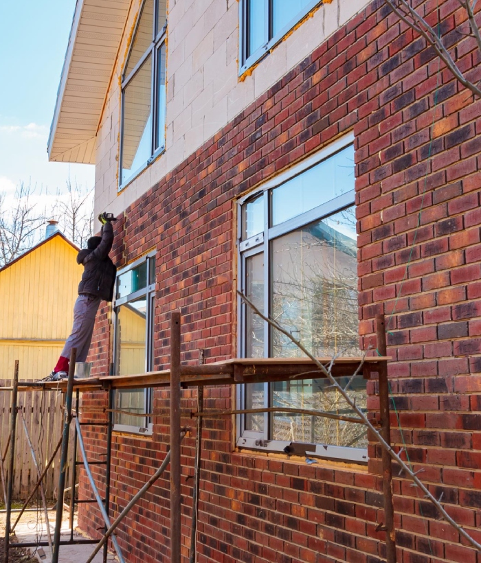Intervention sur façade briques